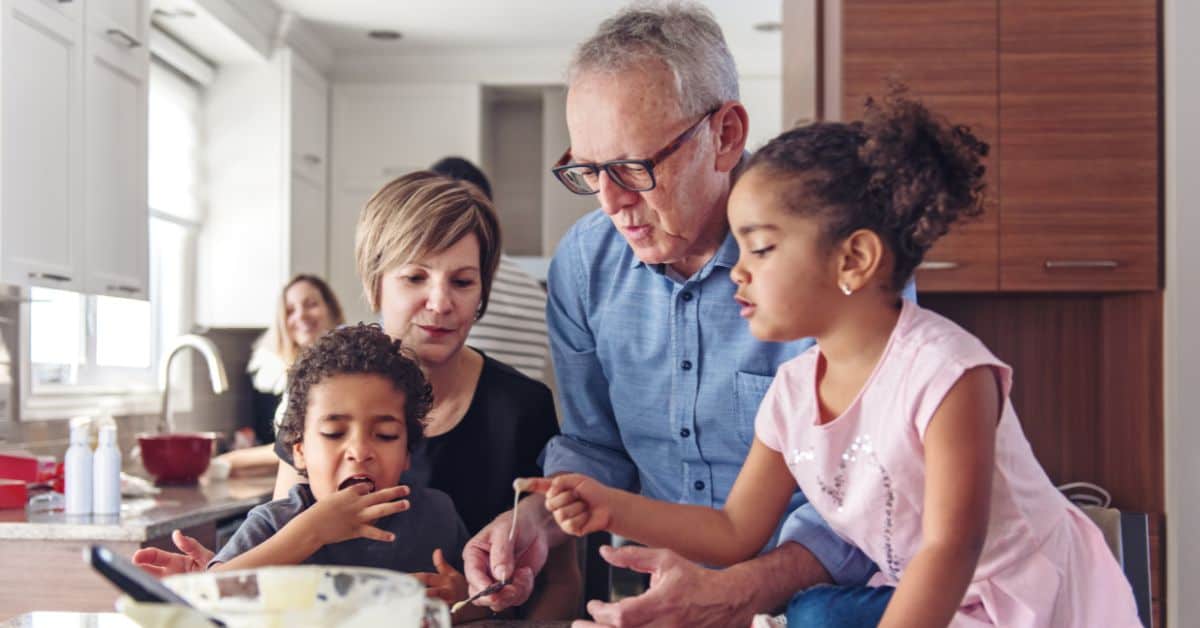 A family gathering and cooking in the kitchen